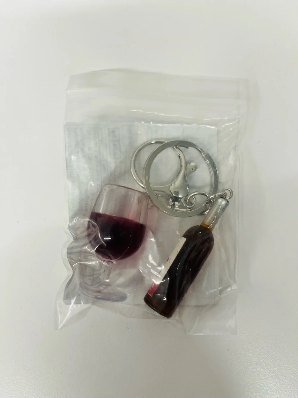 NIP Wineglass & Wine bottle keychain.